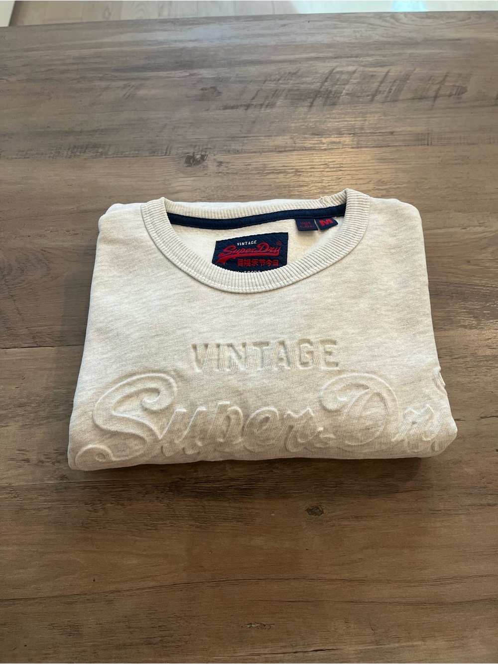 Superdry Men’s Crewneck Sweater in Light Cream with Embossed Logo